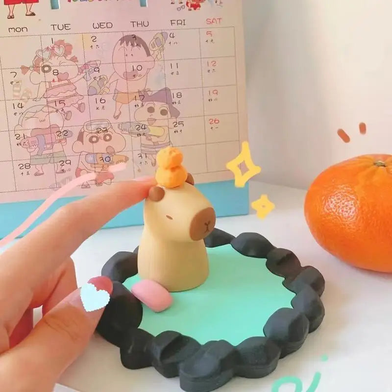 Image of Capybara Hot Springs Phone Stand: The Ultimate Cute and Functional Desk Accessory